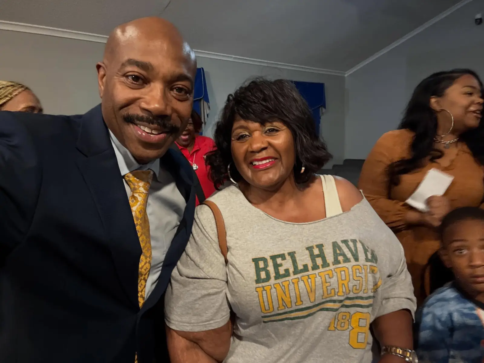 Pastor taking a selfie with a smiling church member